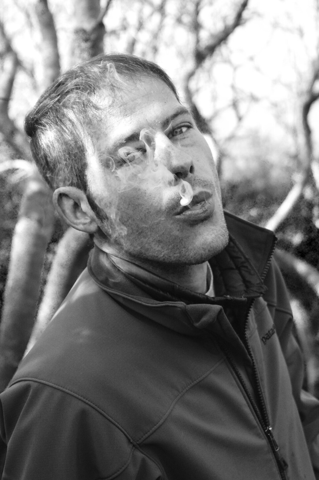 Portrait of a man with short hair in a jacket